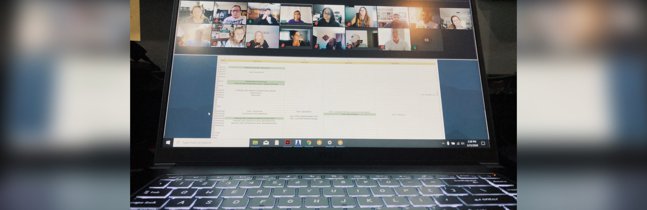Photo of a laptop displaying a teleconference meeting between Diamond Media Solutions employees