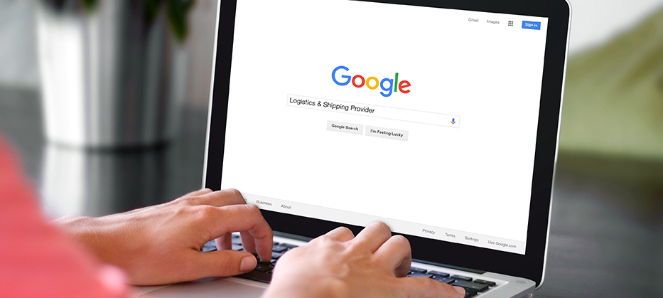 a photo of a woman typing a search query into the Google search engine