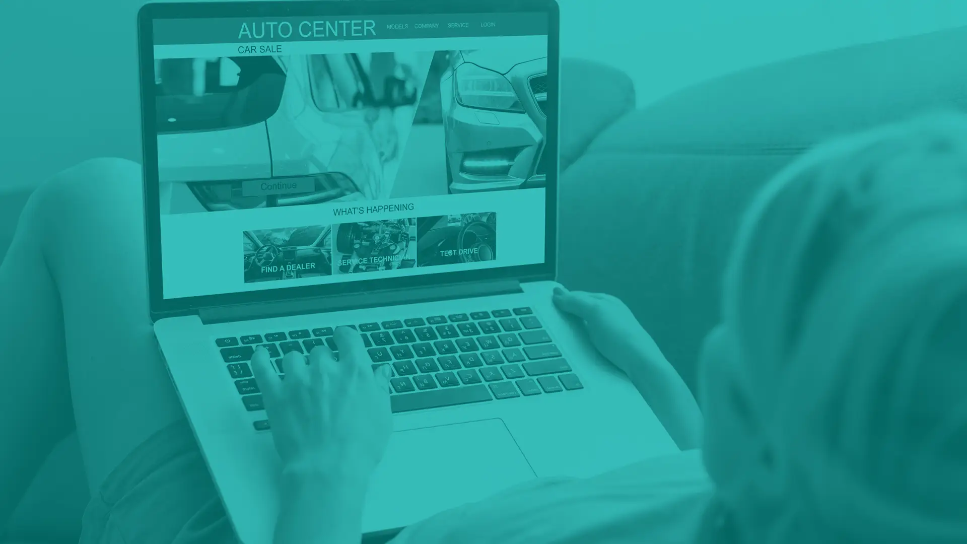 Woman with laptop shopping on an automotive website which is displayed on the laptop screen.
