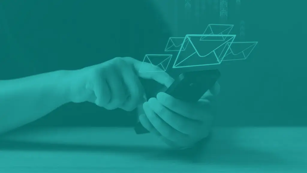 Email received on smart phone concept. Hands holding smaert phone with envelope icons floating over it