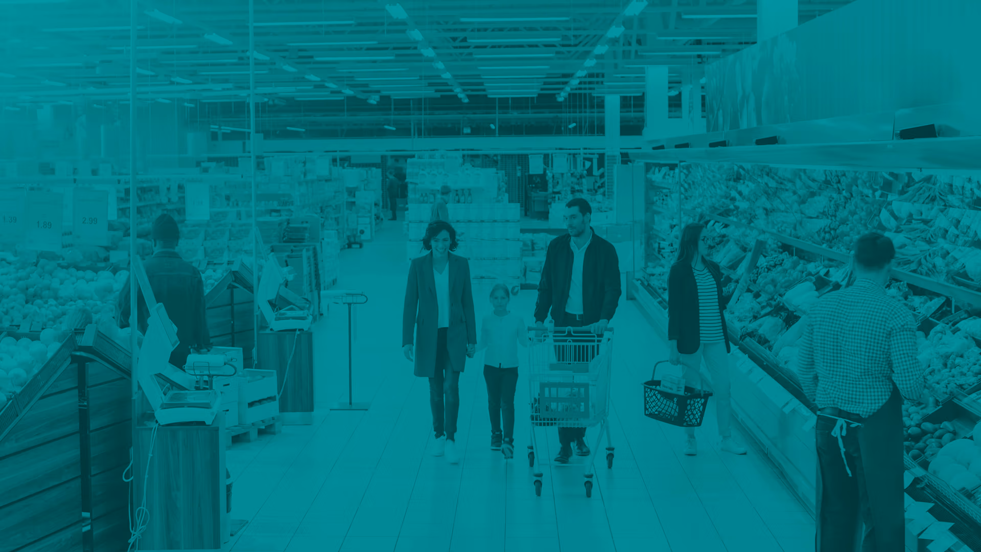 scene in grocery store of couple walking down isle shopping with other shoppers in the backgroundother