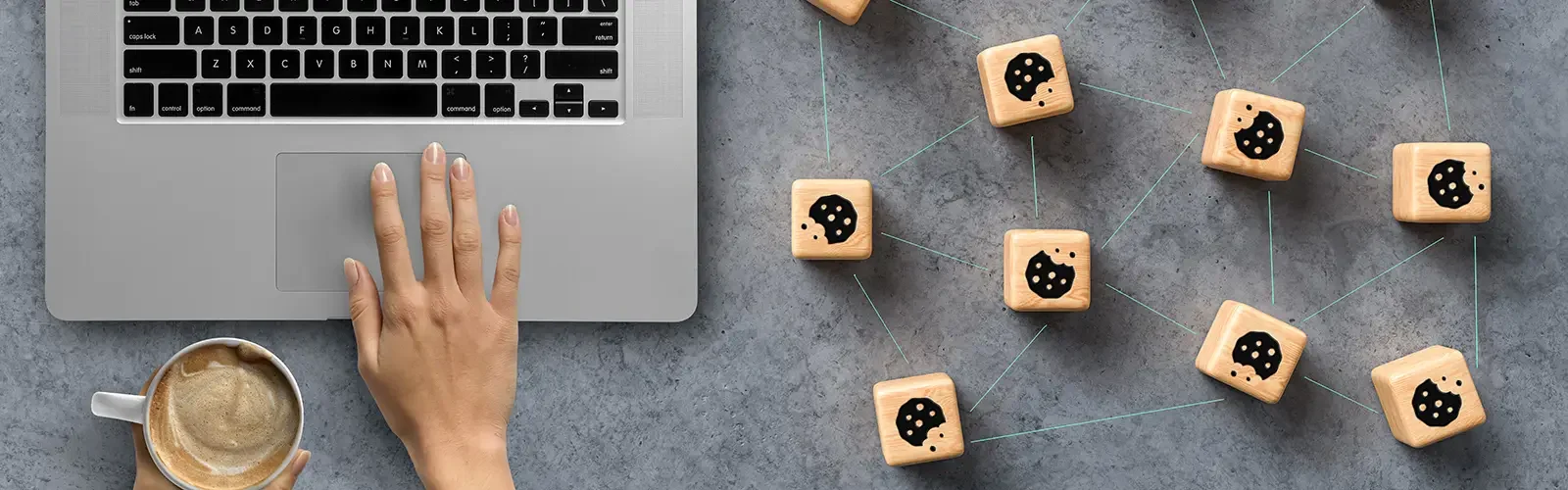 Dice with Cookie icons and a laptop conceptual of the GDPR regulations introduced by the EU governing data collection and privacy of information for individuals online.